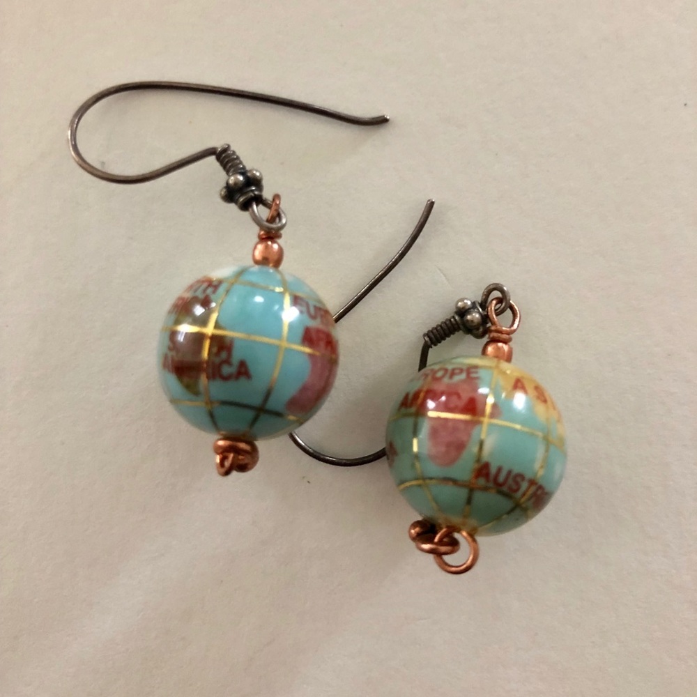 Globe hanging earrings